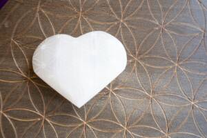 heart made of stone crystal with flower of life pattern